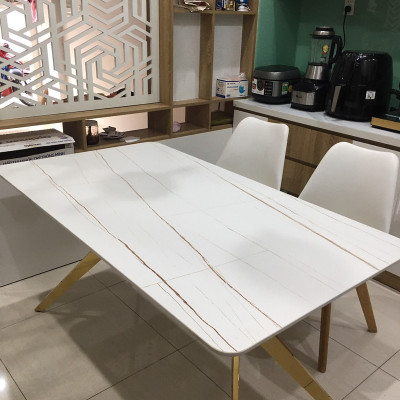 Bàn ăn đá ceramic tia chớp 1m4 tặng kèm 2 ghế eames nệm